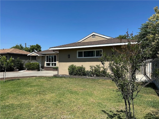 9387 Frankfort Ave, Fontana, CA 92335 - single story home with stucco siding and a front lawn