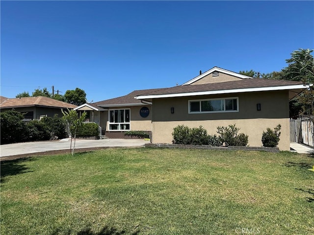 9387 Frankfort Ave, Fontana, CA 92335 - ranch-style home with stucco siding and a shingled roof