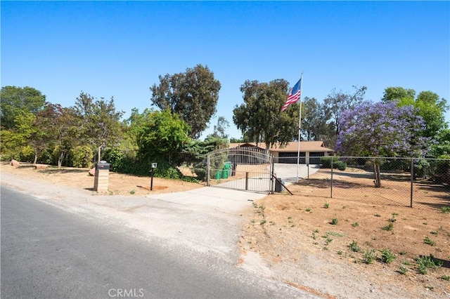 18561 Bert Rd, Riverside, CA 92508 - view of front of house featuring a gate and concrete driveway