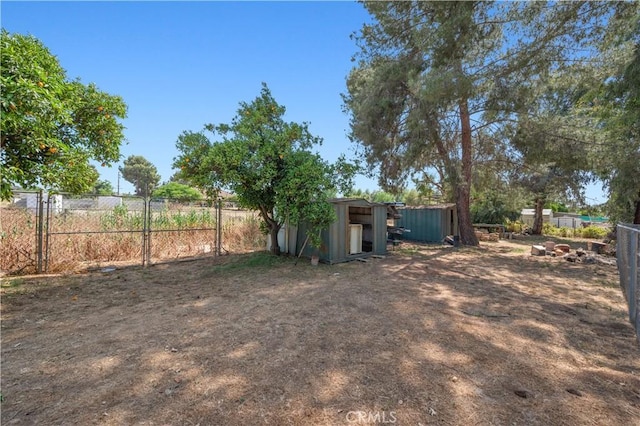18561 Bert Rd, Riverside, CA 92508 - view of yard with a storage unit