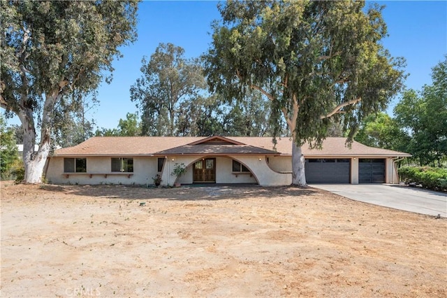18561 Bert Rd, Riverside, CA 92508 - single story home with driveway, a garage, and stucco siding