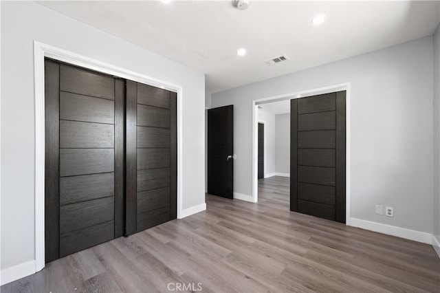 18561 Bert Rd, Riverside, CA 92508 - unfurnished bedroom featuring light wood finished floors, recessed lighting, and a closet