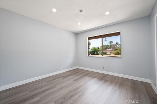 18561 Bert Rd, Riverside, CA 92508 - unfurnished room with wood finished floors, recessed lighting, and a smoke detector