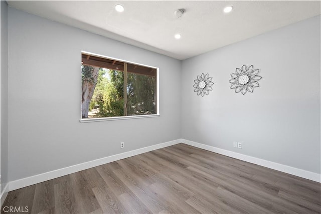 18561 Bert Rd, Riverside, CA 92508 - spare room with recessed lighting, a smoke detector, and wood finished floors