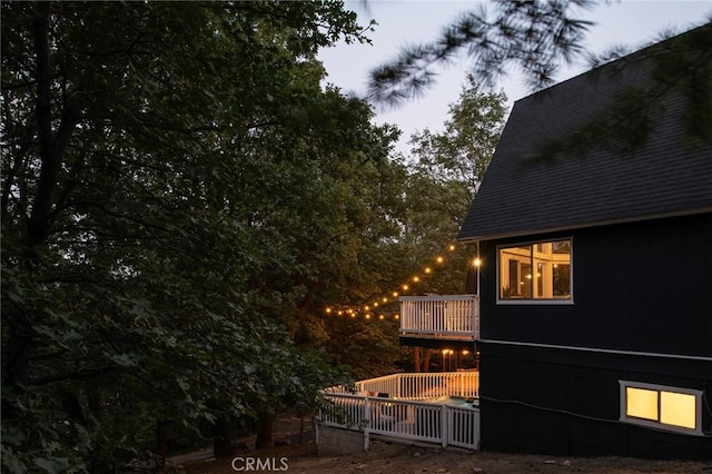 27984 St Bernard Ln, Lake Arrowhead, CA 92352 - view of side of home with a balcony and roof with shingles