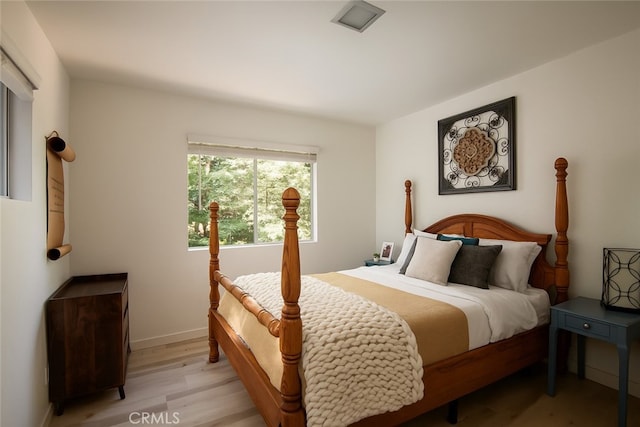 27984 St Bernard Ln, Lake Arrowhead, CA 92352 - bedroom featuring light wood-style flooring and baseboards