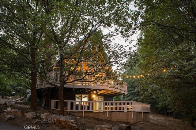 27984 St Bernard Ln, Lake Arrowhead, CA 92352 - back of house with a wooden deck