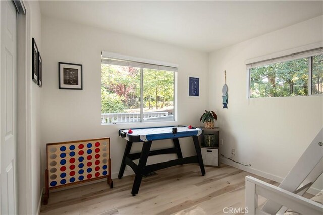 27984 St Bernard Ln, Lake Arrowhead, CA 92352 - home office with light wood-style flooring and baseboards