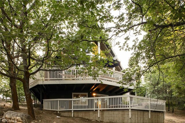 27984 St Bernard Ln, Lake Arrowhead, CA 92352 - back of property featuring a wooden deck