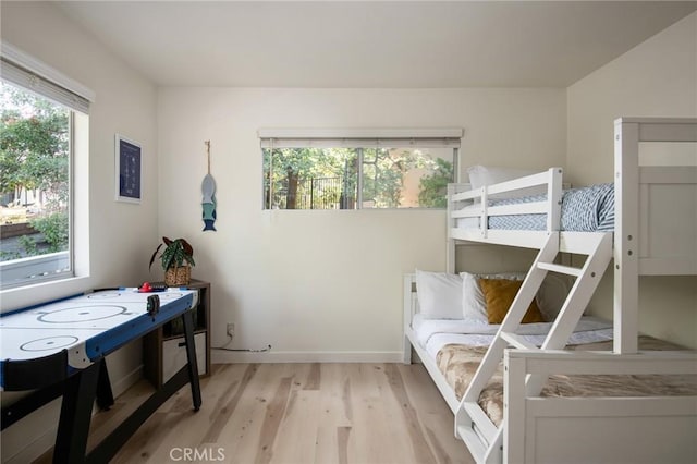 27984 St Bernard Ln, Lake Arrowhead, CA 92352 - bedroom featuring wood finished floors and baseboards