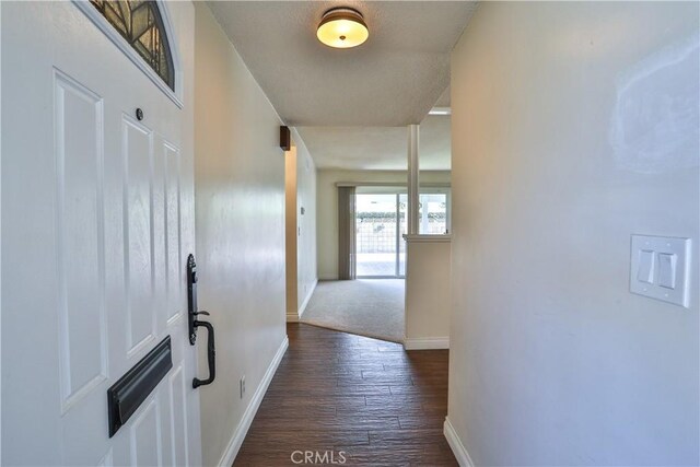 12682 Saint Mark St, Garden Grove, CA 92845 - hallway featuring baseboards and dark wood-style flooring