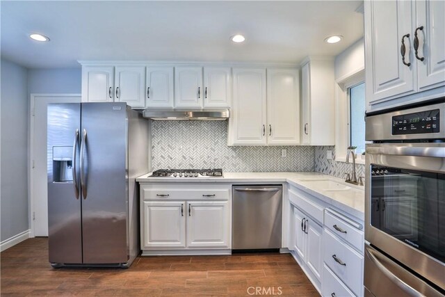 12682 Saint Mark St, Garden Grove, CA 92845 - kitchen featuring appliances with stainless steel finishes, white cabinets, and recessed lighting