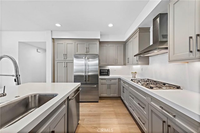 1309 Doheny Way, Dana Point, CA 92629 - kitchen featuring appliances with stainless steel finishes, wall chimney range hood, gray cabinets, light countertops, and recessed lighting