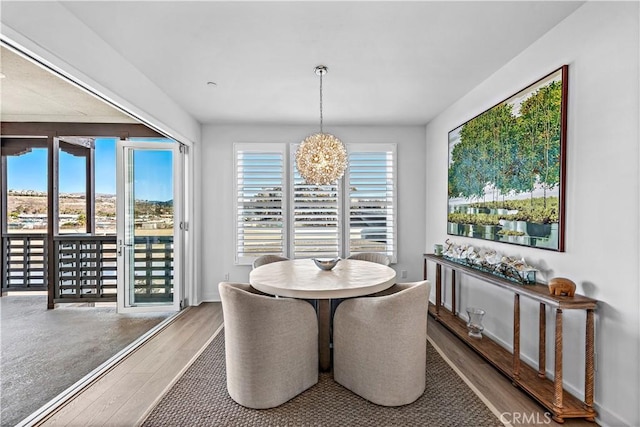 1309 Doheny Way, Dana Point, CA 92629 - dining room featuring wood finished floors and a chandelier