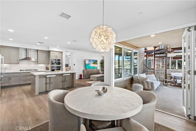1309 Doheny Way, Dana Point, CA 92629 - dining space featuring light wood-type flooring, a chandelier, and recessed lighting