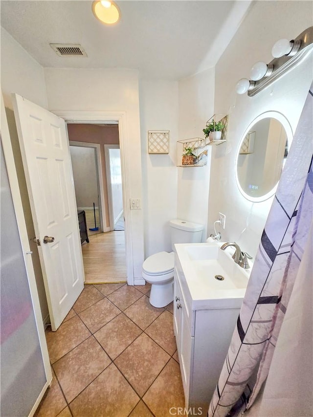 9313 Dearborn Ave, South Gate, CA 90280 - bathroom featuring vanity and tile patterned flooring