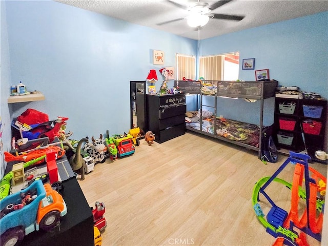 9313 Dearborn Ave, South Gate, CA 90280 - playroom with a ceiling fan and wood finished floors