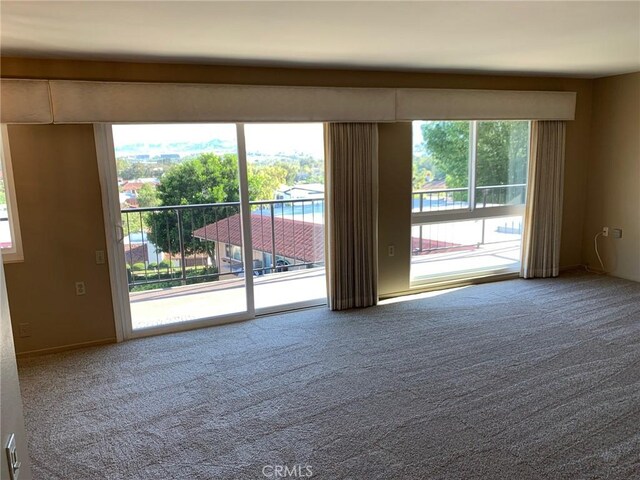 3110 Via Serena S Unit Q, Laguna Woods, CA 92637 - unfurnished living room featuring carpet