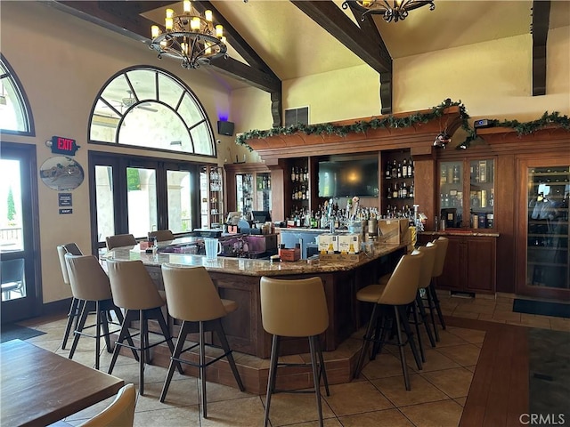 3110 Via Serena S Unit Q, Laguna Woods, CA 92637 - indoor dry bar featuring high vaulted ceiling, a chandelier, light tile patterned floors, and beam ceiling