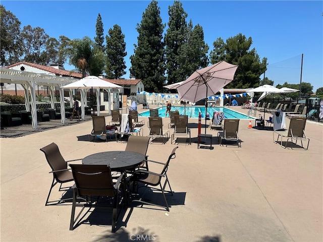 3110 Via Serena S Unit Q, Laguna Woods, CA 92637 - view of patio / terrace with a pergola and a community pool
