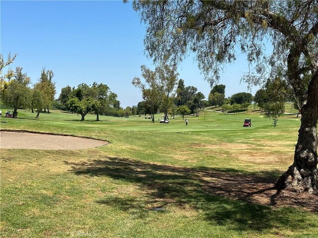 3110 Via Serena S Unit Q, Laguna Woods, CA 92637 - view of home's community with a lawn