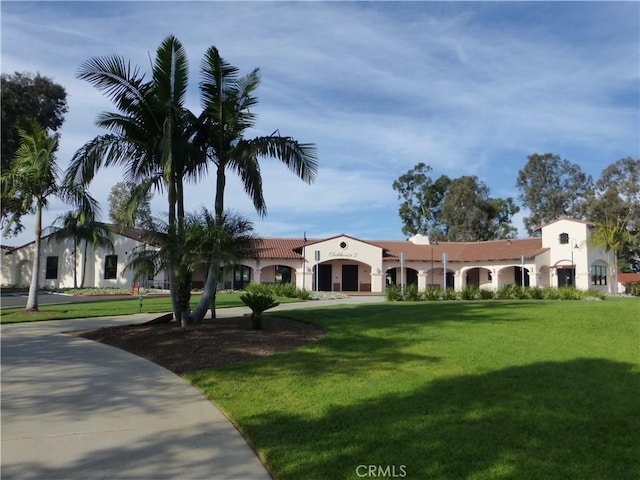 3110 Via Serena S Unit Q, Laguna Woods, CA 92637 - mediterranean / spanish house with a front lawn and stucco siding