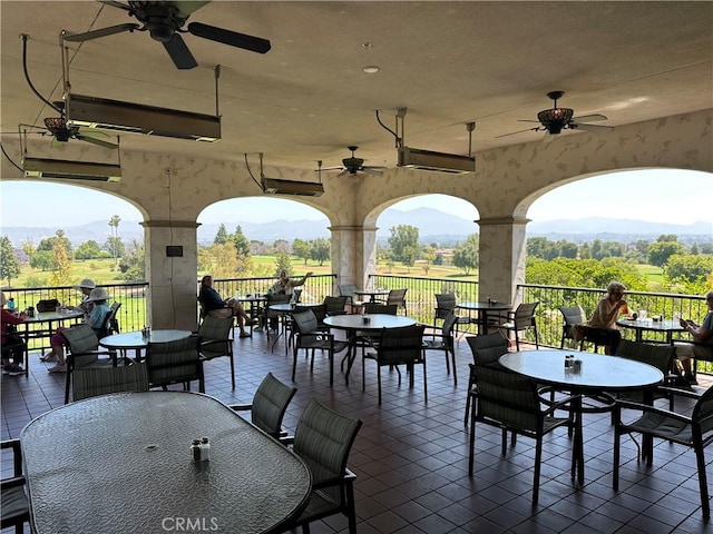 3110 Via Serena S Unit Q, Laguna Woods, CA 92637 - view of patio / terrace featuring outdoor dining area, ceiling fan, and a mountain view