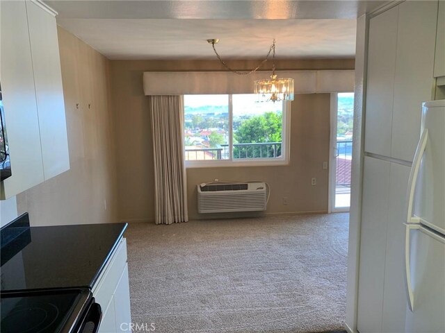 3110 Via Serena S Unit Q, Laguna Woods, CA 92637 - unfurnished dining area with plenty of natural light and carpet