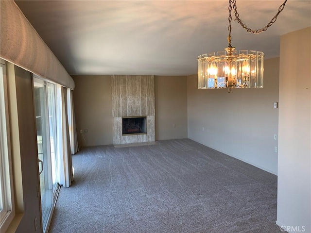 3110 Via Serena S Unit Q, Laguna Woods, CA 92637 - unfurnished living room featuring carpet flooring, a high end fireplace, and a chandelier