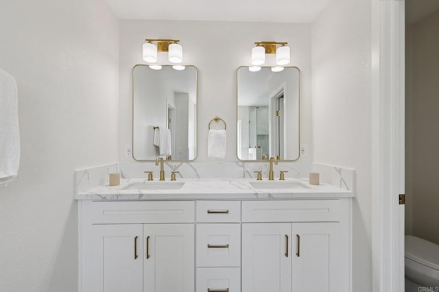 5471 Papagallo Dr, Oceanside, CA 92057 - bathroom featuring toilet and double vanity