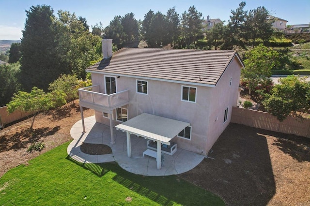 5471 Papagallo Dr, Oceanside, CA 92057 - back of property with a patio, a chimney, a tile roof, and stucco siding