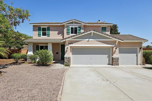 5471 Papagallo Dr, Oceanside, CA 92057 - view of front facade featuring stucco siding, driveway, stone siding, and a garage
