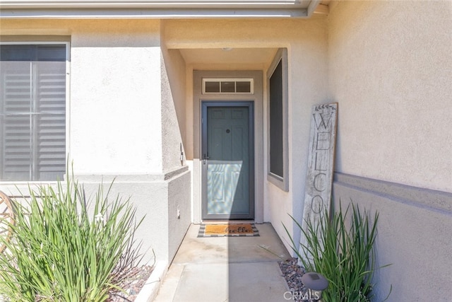 31735 Mesa View Dr, Menifee, CA 92584 - entrance to property with stucco siding