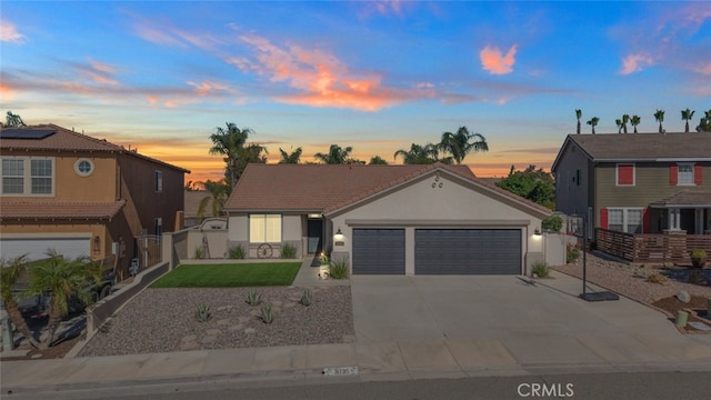 31735 Mesa View Dr, Menifee, CA 92584 - view of front of house featuring a garage, stucco siding, concrete driveway, and a tile roof