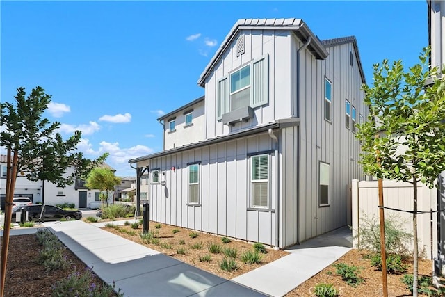 32813 Brunello Way, Temecula, CA 92591 - view of side of home featuring board and batten siding