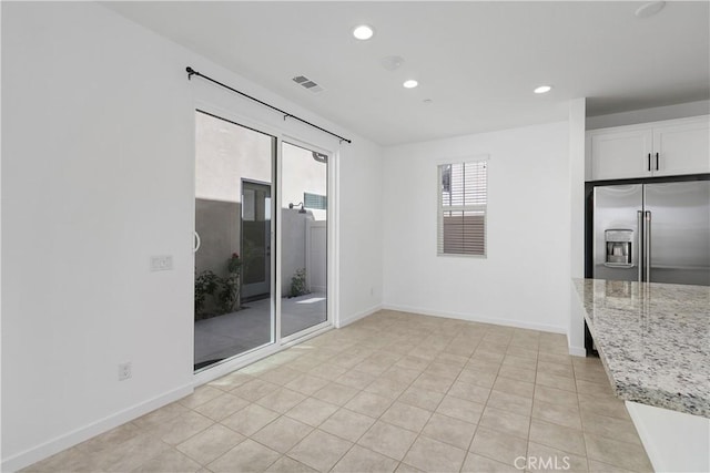 32813 Brunello Way, Temecula, CA 92591 - spare room with recessed lighting and light tile patterned floors