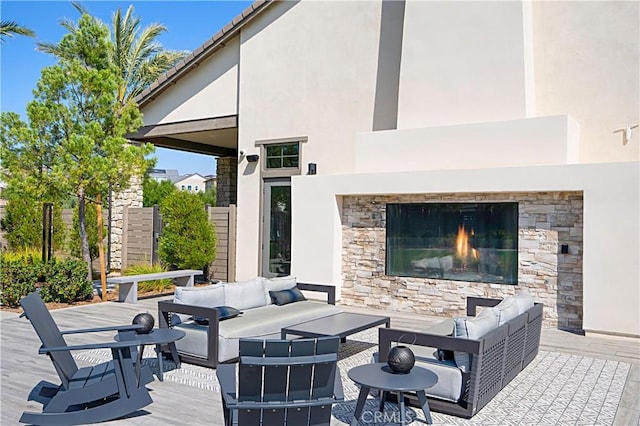 32813 Brunello Way, Temecula, CA 92591 - view of patio / terrace featuring an outdoor living space with a fireplace