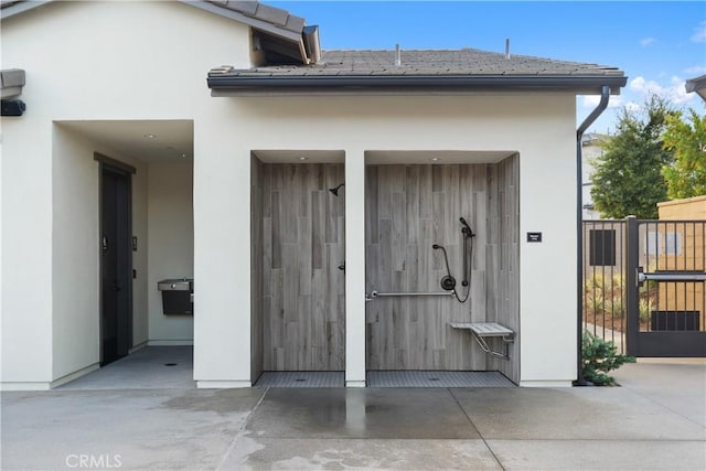 32813 Brunello Way, Temecula, CA 92591 - doorway to property featuring stucco siding and a gate
