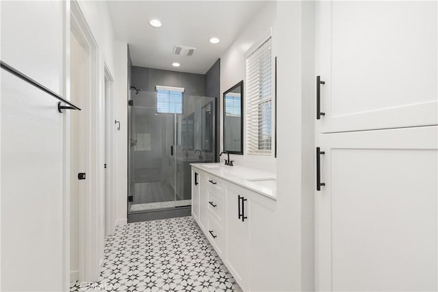 32813 Brunello Way, Temecula, CA 92591 - full bath featuring a shower stall, double vanity, recessed lighting, and tile patterned floors