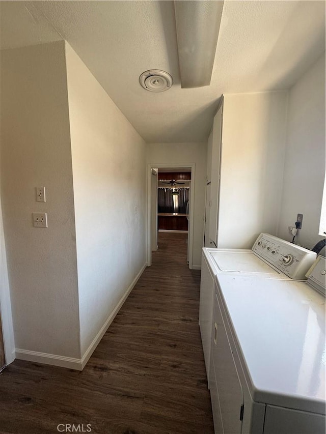 1004 Paloma St, Bakersfield, CA 93304 - washroom featuring washer and clothes dryer and dark wood-type flooring