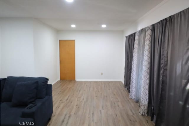 1004 Paloma St, Bakersfield, CA 93304 - living area with wood finished floors and recessed lighting