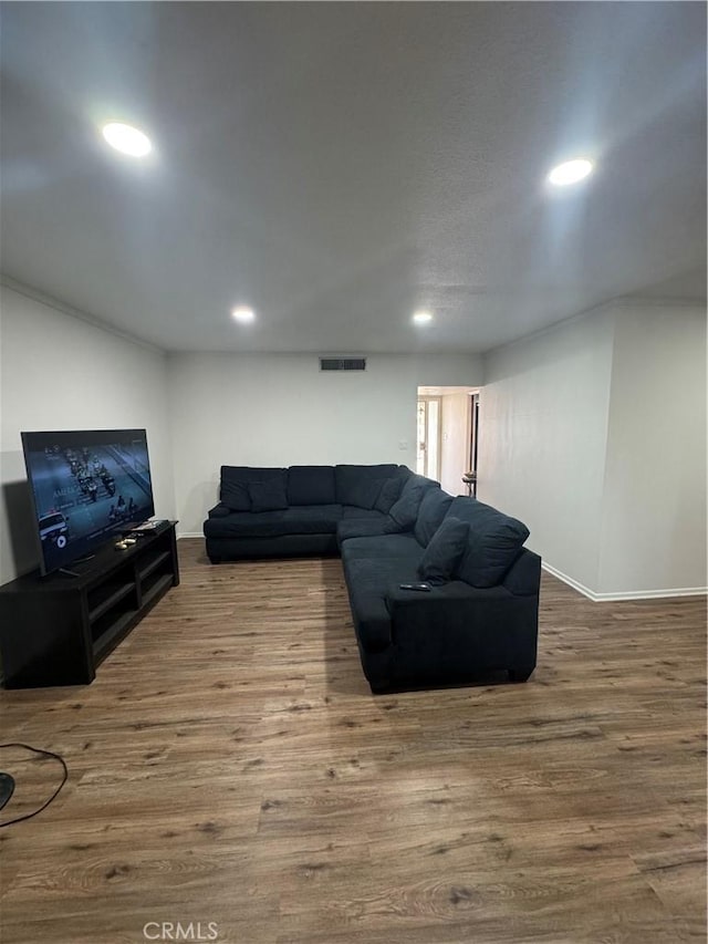 1004 Paloma St, Bakersfield, CA 93304 - living room featuring wood finished floors and recessed lighting