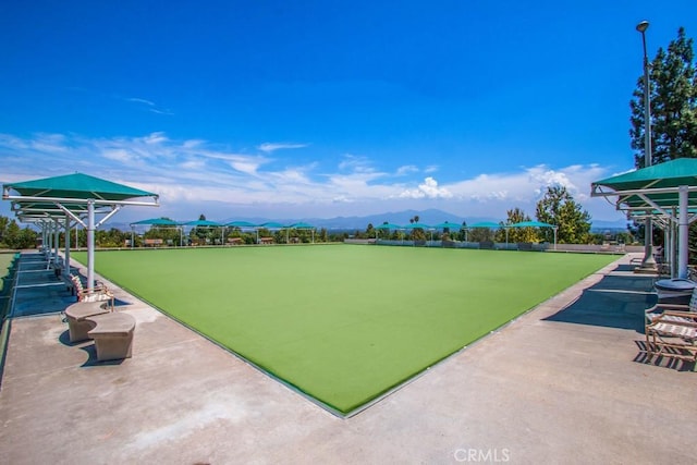 5371 Punta Alta Unit 2G, Laguna Woods, CA 92637 - view of yard featuring a bocce ball area and a mountain view