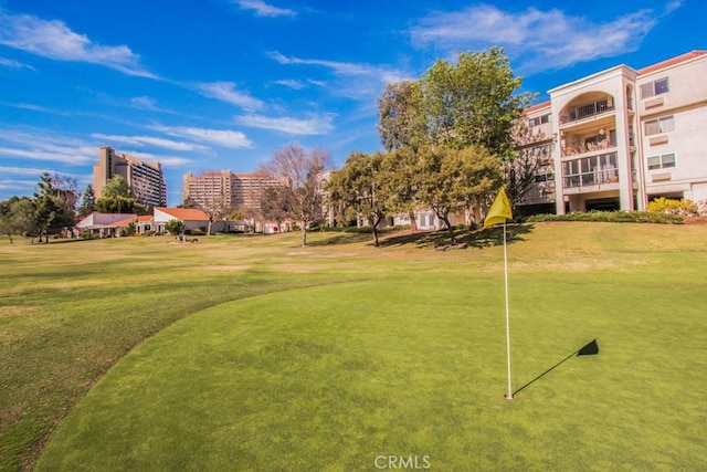 5371 Punta Alta Unit 2G, Laguna Woods, CA 92637 - view of property's community featuring a lawn and a putting green