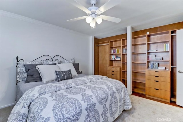 5371 Punta Alta Unit 2G, Laguna Woods, CA 92637 - bedroom featuring ornamental molding, ceiling fan, and carpet