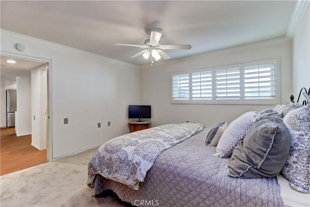 5371 Punta Alta Unit 2G, Laguna Woods, CA 92637 - carpeted bedroom with crown molding, a ceiling fan, and freestanding refrigerator