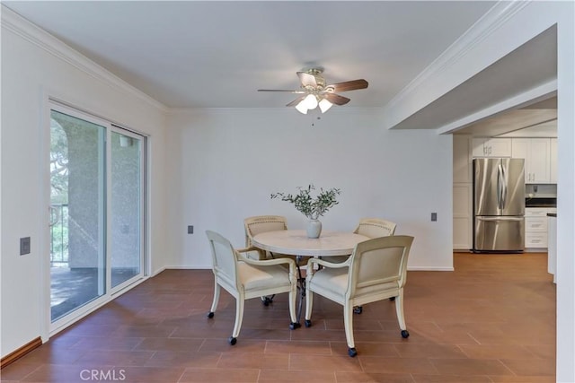 5371 Punta Alta Unit 2G, Laguna Woods, CA 92637 - dining room featuring a ceiling fan and crown molding