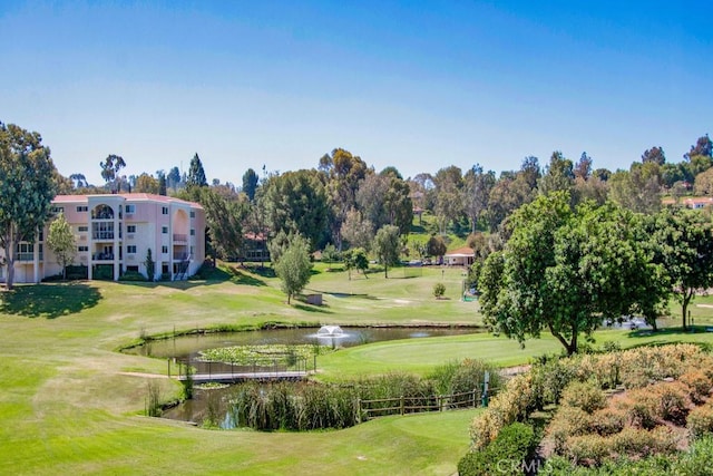 5371 Punta Alta Unit 2G, Laguna Woods, CA 92637 - surrounding community featuring golf course view, a lawn, a water view, and view of scattered trees