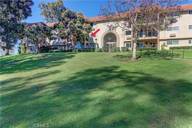 5371 Punta Alta Unit 2G, Laguna Woods, CA 92637 - view of yard featuring a balcony