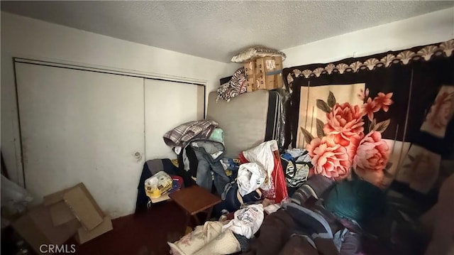 10218 Virginia Ave, South Gate, CA 90280 - bedroom featuring a textured ceiling and a closet